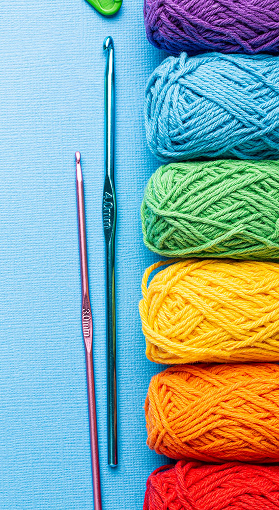 Colorful crochet yarn and hooks